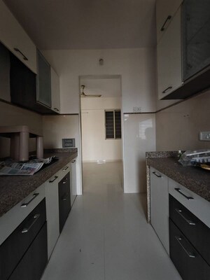 Kitchen in 2 BHK Apartment at Group Seven Rushi Heights, Goregaon East – for Rent