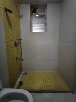 Bathroom in 2 BHK Apartment at Group Seven Rushi Heights, Goregaon East – for Rent