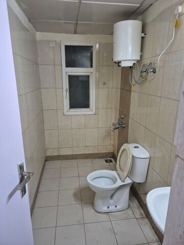 Bathroom in 2.5 BHK Apartment at Mahindra Aura, Sector 110a – for Rent