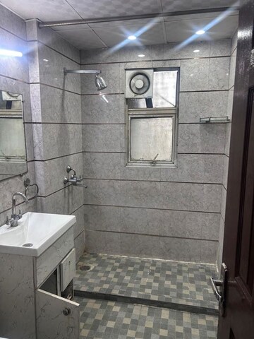 Bathroom in 4 BHK Apartment at Mahagun Maple, Sector 50 – for Rent