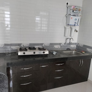 Kitchen in 2 BHK Apartment at Vardhaman Moonstone, Tathawade – for Rent
