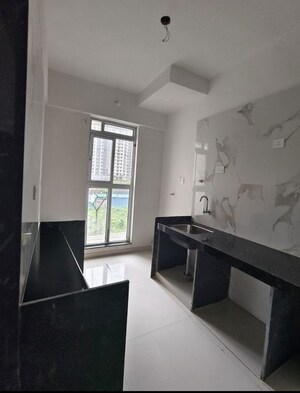 Kitchen in 2 BHK Apartment at Kohinoor Highland, Dombivli East – for Sale