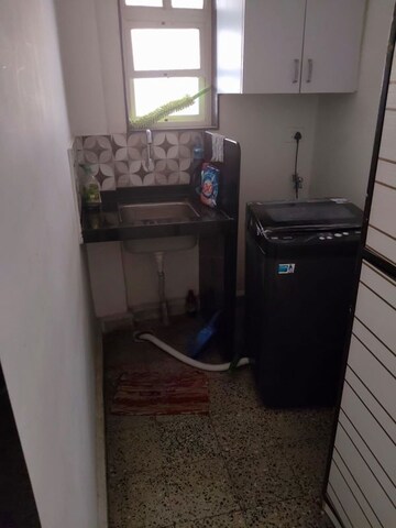 Kitchen in 3.5 BHK Apartment at Sunit CHS, Model Colony – for Rent