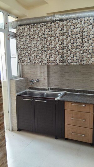 Kitchen in 3 BHK Apartment at Amrapali Eden Park, Sector 50 – for Rent