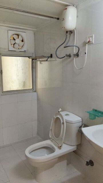 Bathroom in 3 BHK Apartment at Amrapali Eden Park, Sector 50 – for Rent