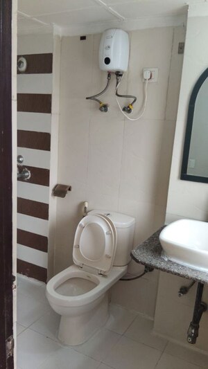 Bathroom in 3 BHK Apartment at Amrapali Eden Park, Sector 50 – for Rent