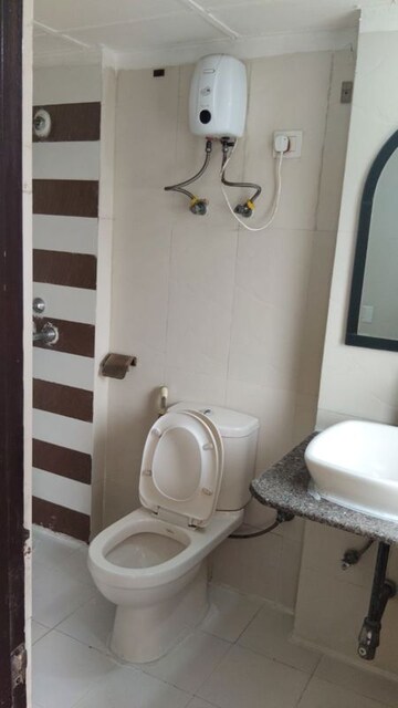 Bathroom in 3 BHK Apartment at Amrapali Eden Park, Sector 50 – for Rent