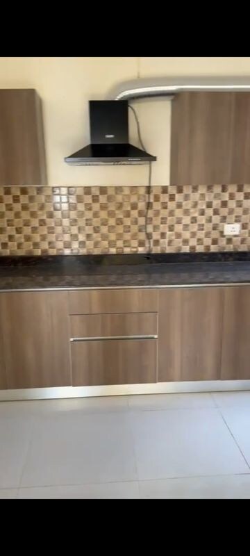 Kitchen in 4 BHK Apartment at Adani Oyster Arcade, Sector 102 – for Rent