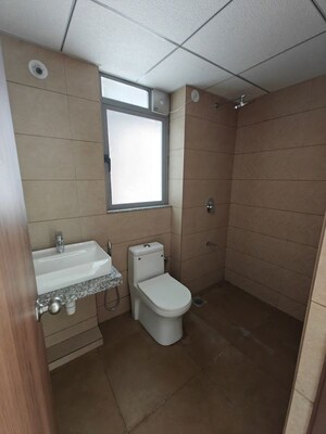Bathroom in 2 BHK Apartment at Kalpataru Immensa, Kolshet Road – for Rent