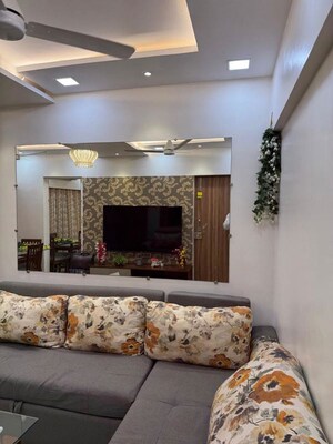 Living Room in 1 BHK Apartment at Monarch CHS, Andheri East – for Sale