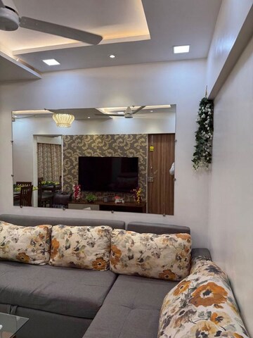 Living Room in 1 BHK Apartment at Monarch CHS, Andheri East – for Sale