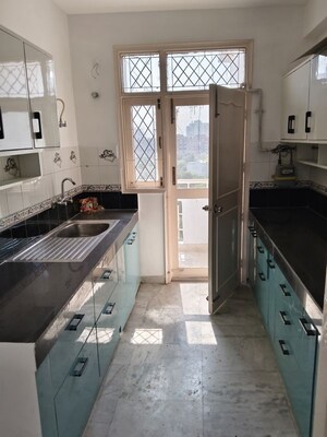 Kitchen in 4 BHK Apartment at Royal Towers Noida, Sector 61 – for Rent