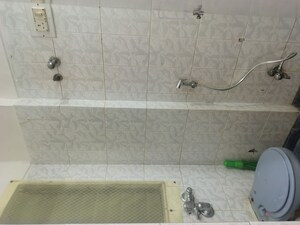 Bathroom in 2 BHK Apartment at Royal Classic Co Op Society, Andheri West – for Rent