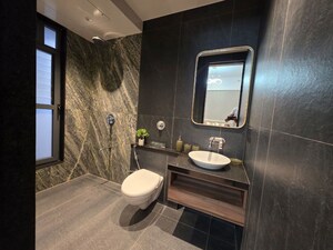 Living Room in 3 BHK Apartment at Unique Envogue, Mundhwa – for Sale