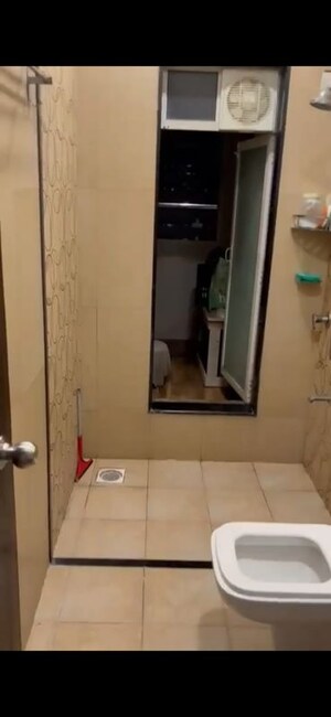 Bathroom in 2 BHK Apartment at Samartha Deep, Andheri West – for Rent