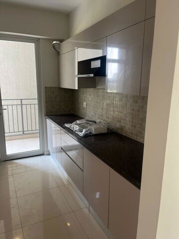 Kitchen in 3 BHK Apartment at Godrej Woods, Sector 43 – for Rent