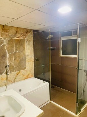 Bathroom in 4 BHK Apartment at Kolte Patil 24K Glitterati, Pimple Nilakh – for Sale