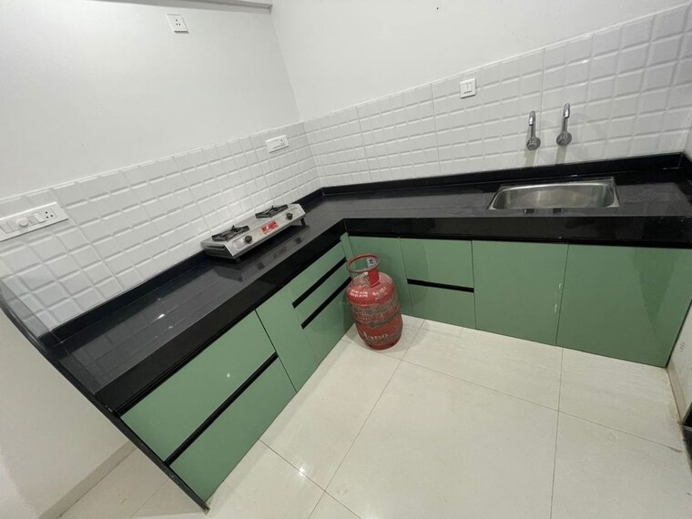 Kitchen, bhaktamar-residency 2 Bedroom 844 Sq.Ft. Apartment In Wadgaon Sheri Pune 9981584