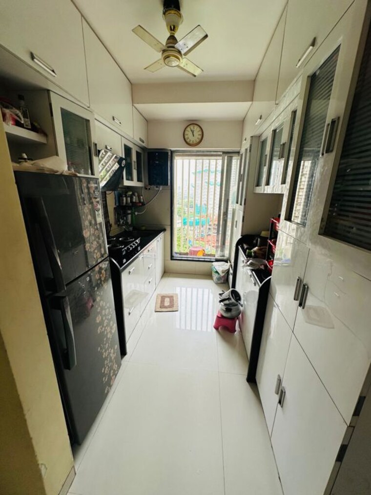 Kitchen, unique-poonam-estate-cluster-3 2 Bedroom 735 Sq.Ft. Apartment In Mira Road Thane 9981693
