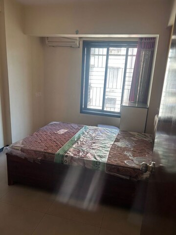 Bedroom in 3 BHK Apartment at Hyde Park CHS, Kharghar – for Rent