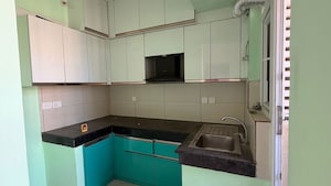Kitchen in 2 BHK Apartment at Tata Eureka Park, Sector 150 – for Rent