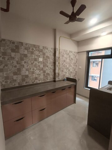Kitchen in 1 BHK Apartment at DGS Sheetal Tapovan, Malad East – for Sale