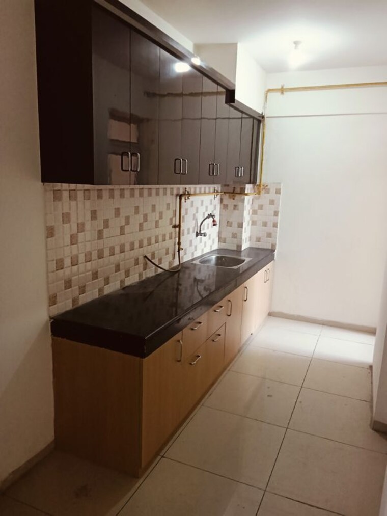 Kitchen, wave-dream-homes 2 Bedroom 808 Sq.Ft. Apartment In Wave City Ghaziabad 9982458