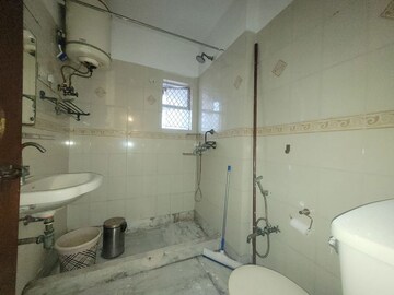 Bathroom in 3 BHK Builder Floor at Panchsheel Enclave – for Rent