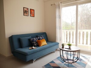 Living Room in 1 BHK Apartment at Revora – for Rent