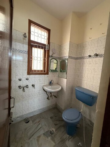 Bathroom in 2 BHK Builder Floor at Kalkaji – for Rent