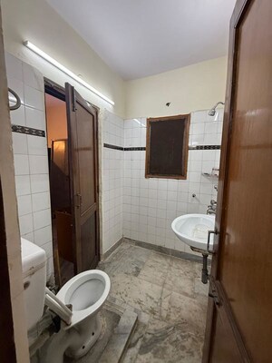 Bathroom in 2 BHK Builder Floor at Kalkaji – for Rent