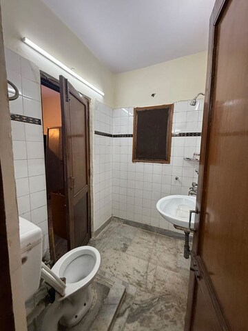 Bathroom in 2 BHK Builder Floor at Kalkaji – for Rent