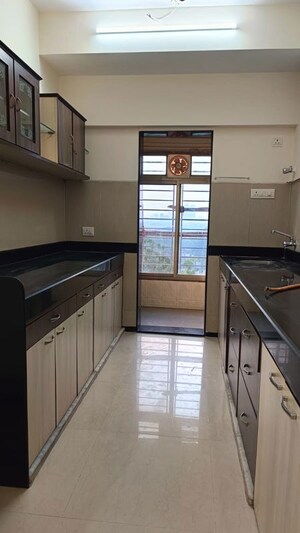 Kitchen in 2 BHK Apartment at Raheja Willows, Kandivali East – for Rent