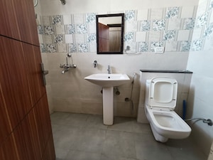 Bathroom in 3 BHK Apartment at Dhakoli – for Rent
