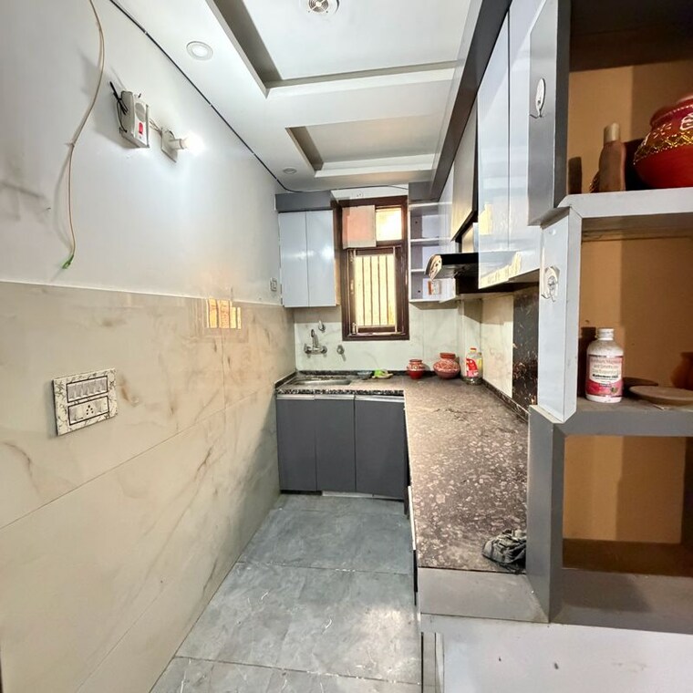 Kitchen, dwarka mor 3 Bedroom 100 Sq.Yd. Builder Floor In Dwarka Mor Delhi 9983118