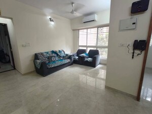 Living Room in 1 BHK Apartment at Lodha Amara, Kolshet Road – for Rent