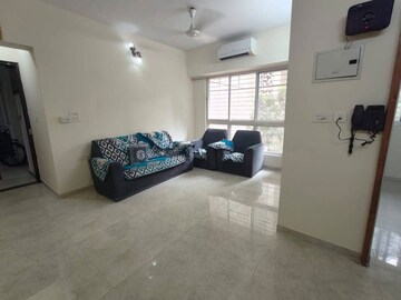 Living Room in 1 BHK Apartment at Lodha Amara, Kolshet Road – for Rent