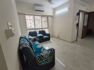 Living Room in 1 BHK Apartment at Lodha Amara, Kolshet Road – for Rent