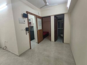 Living Room in 1 BHK Apartment at Lodha Amara, Kolshet Road – for Rent