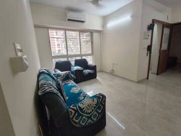 Living Room in 1 BHK Apartment at Lodha Amara, Kolshet Road – for Rent