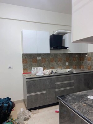 Kitchen in 2 BHK Apartment at Amrapali Golf Homes, Sector 4 Greater Noida – for Rent