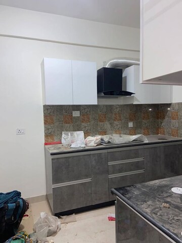 Kitchen in 2 BHK Apartment at Amrapali Golf Homes, Sector 4 Greater Noida – for Rent