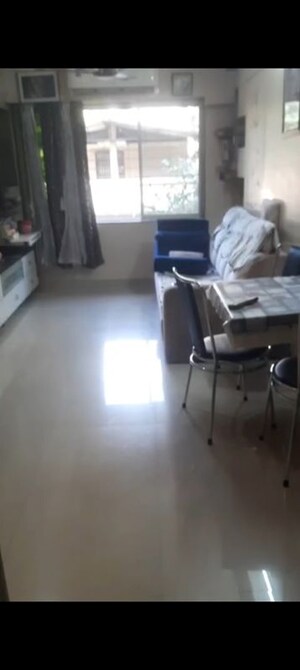 Living Room in 1 BHK Apartment at Malad West – for Sale