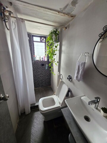 Bathroom in 2 BHK Apartment at Twin Tower CHS Ltd, Andheri East – for Sale