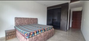 Bedroom in 4 BHK Builder Floor at Vasant Kunj – for Rent
