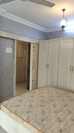 Bedroom in 2 BHK Apartment at K Raheja Raheja Classique, Andheri West – for Rent