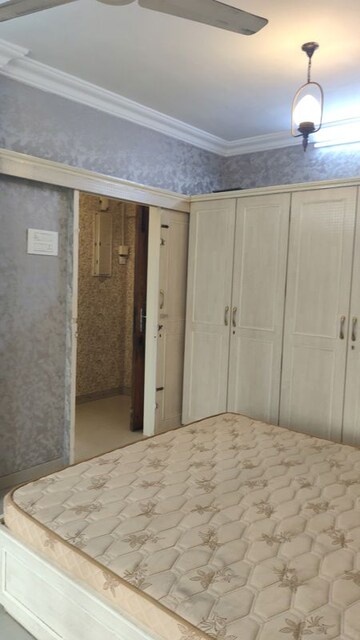 Bedroom in 2 BHK Apartment at K Raheja Raheja Classique, Andheri West – for Rent