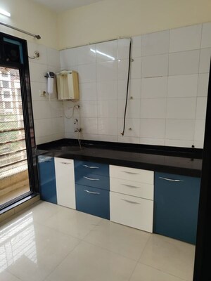 Kitchen in 2 BHK Apartment at Gajra Bhoomi Symphony, Kopar Khairane – for Rent