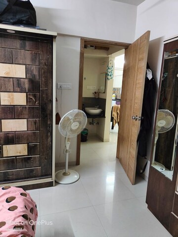 Living Room in 1 BHK Apartment at Abhinav Pebbles Urbania, Bavdhan – for Rent