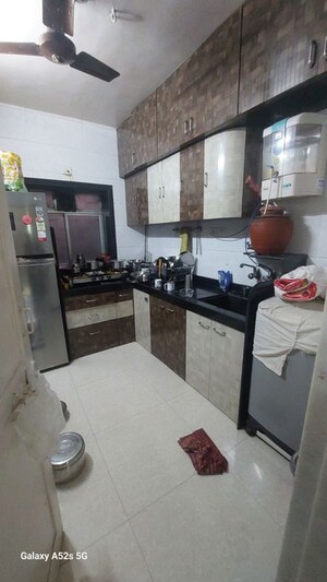 Kitchen in 2 BHK Apartment at Gokuldham CHS Goregaon, Goregaon East – for Rent